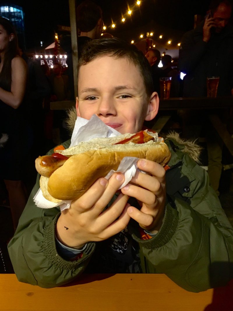 Plankton Tenenbaum eating a massive hotdog from a street food vendor at Hadrian'd Tipi 2017
